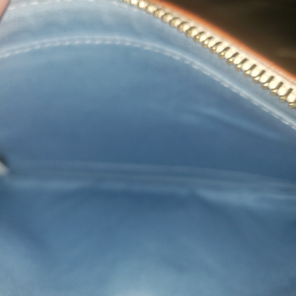 Disney dooney and Bourke wristlet . *SPECIAL PRICE* - Picture 8 of 9